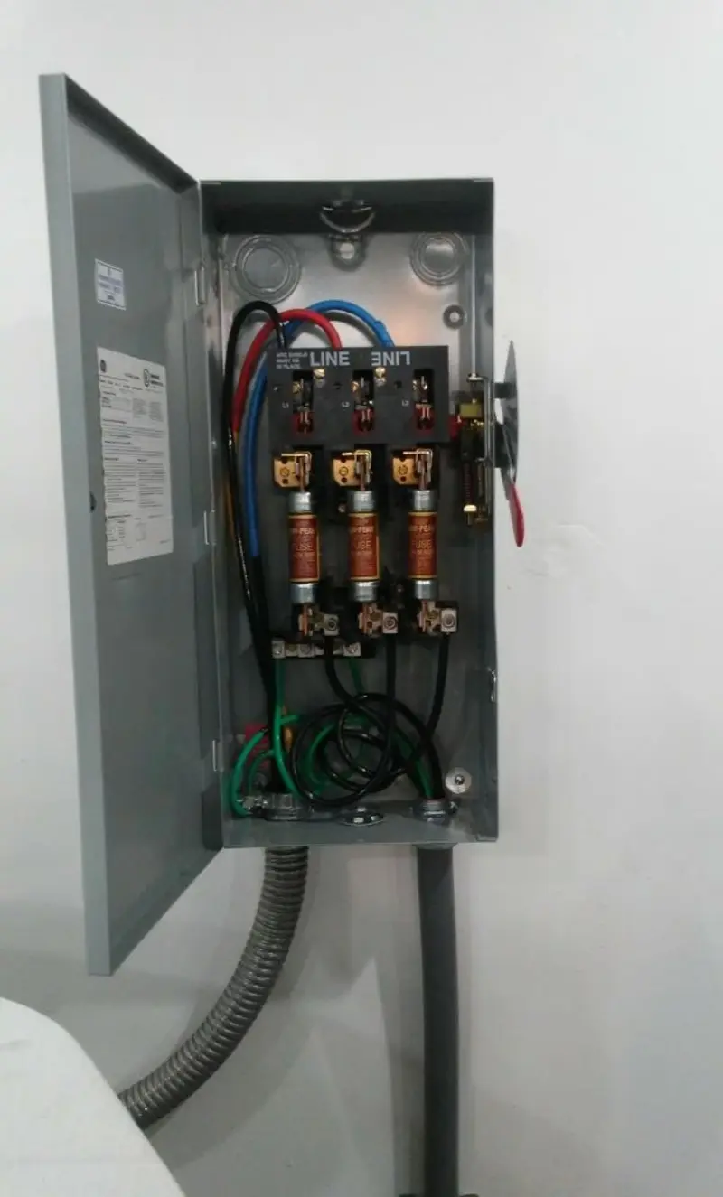 Three-phase disconnect switch installed for Smoke Detector Installation in St. James